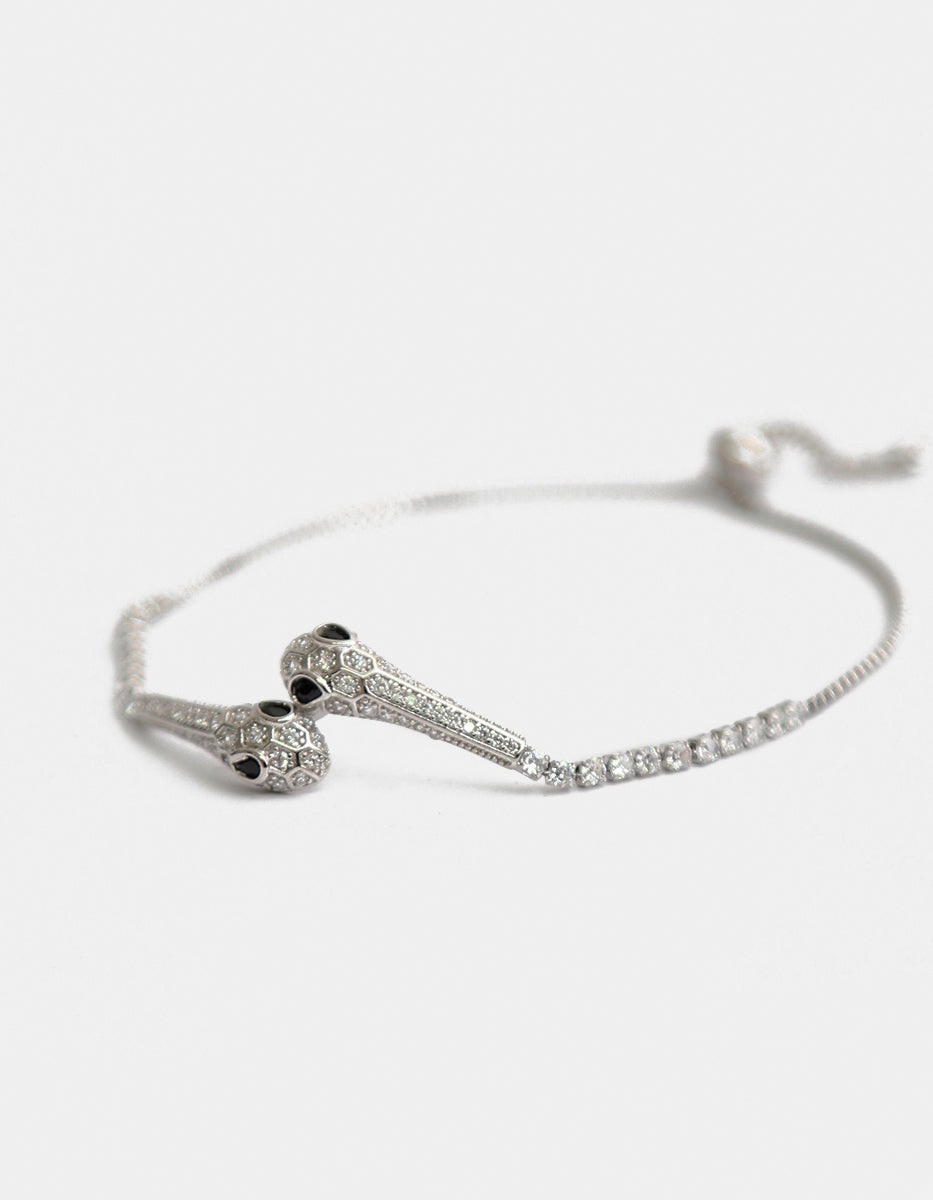Pulsera ajustable en plata .925 con baño de rodio, serpientes, topacios blancos y esmeralda de Bombay Festive Style