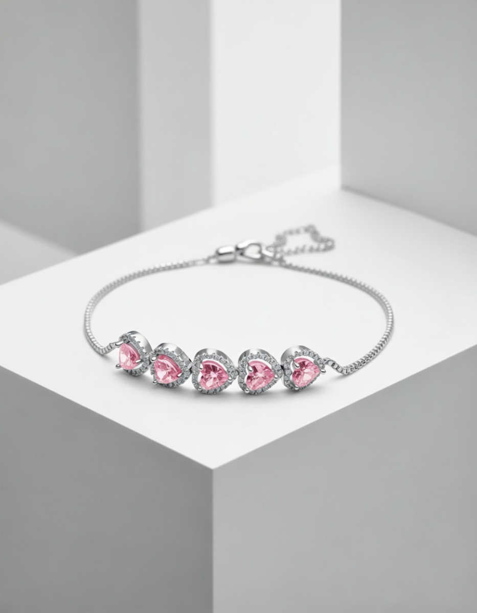 Pulsera ajustable en plata .925 con baño de rodio, cinco corazones y topacios rosas Love Story