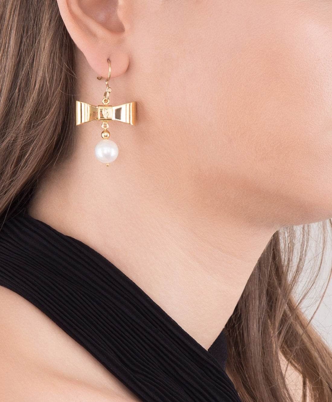 Aretes con forma moño & perla mabe Viena