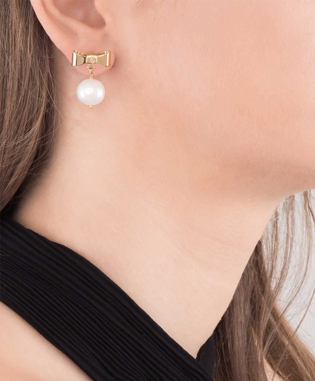 Aretes con forma moño & perla mabe Viena