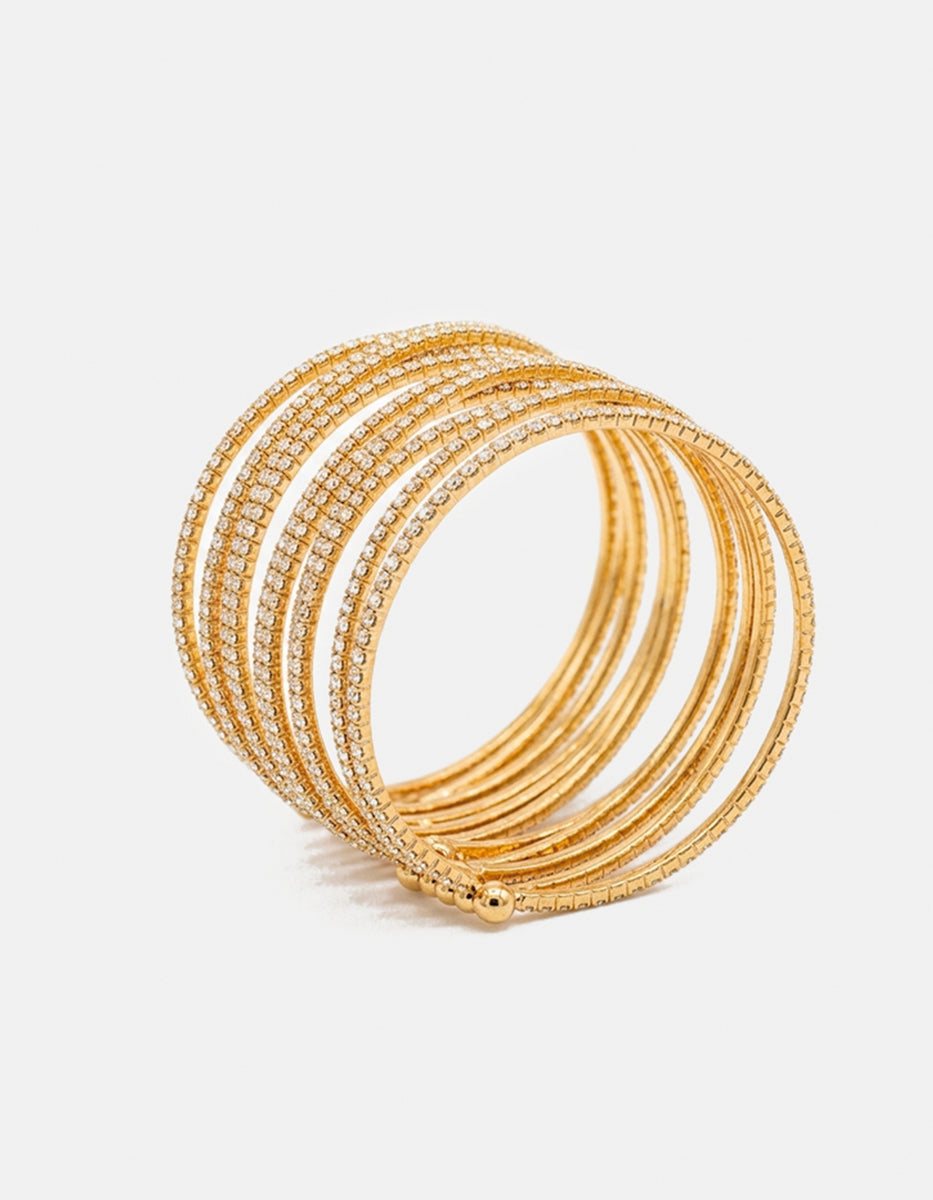 Brazalete de bronce con baño dorado de 12 líneas con topacios blancos Festive Style