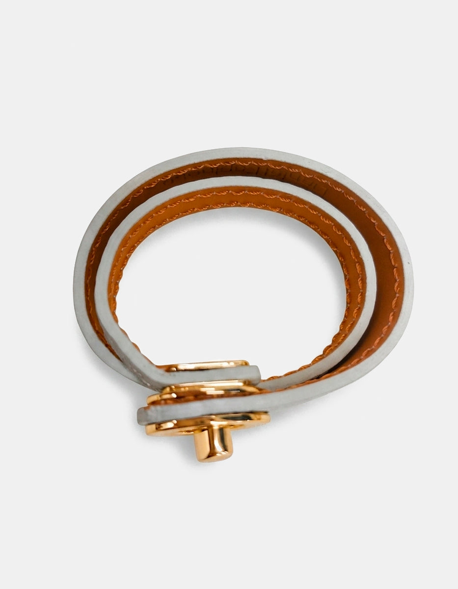 Brazalete de piel sintetica con broche de bronce en baño vermeil 22k