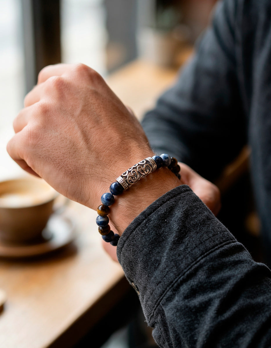 Pulsera de bronce en baño de rodio con ojo de tigre café y azul Nordic