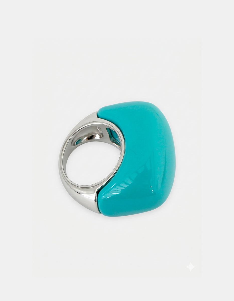 Anillo en baño platino y baquelita tono turquesa Mandragora