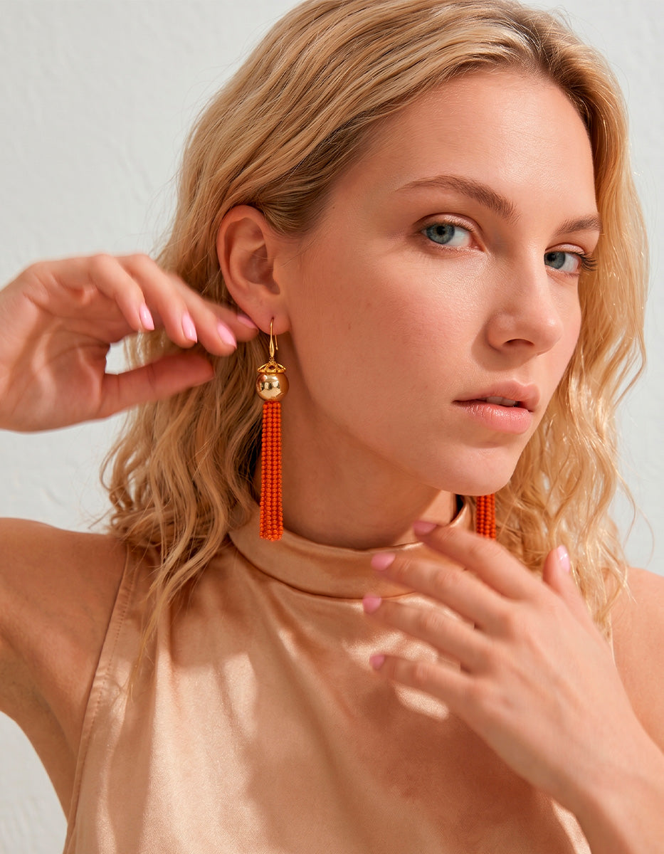 Aretes de bronce en baño de oro 22k con cuentas tono naranja