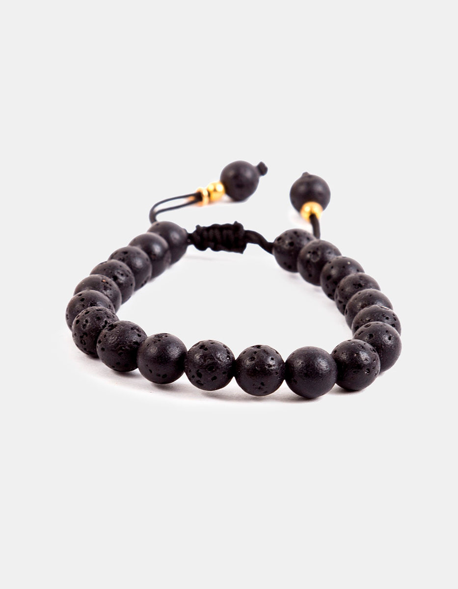 Pulsera de bronce en baño de oro 22 kt con piedra volcánica Nordic