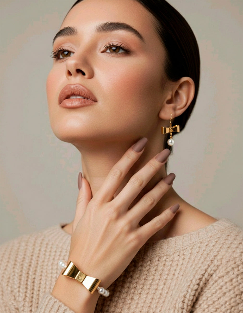 Set de Pulsera y pendientes de moño con perla mabe