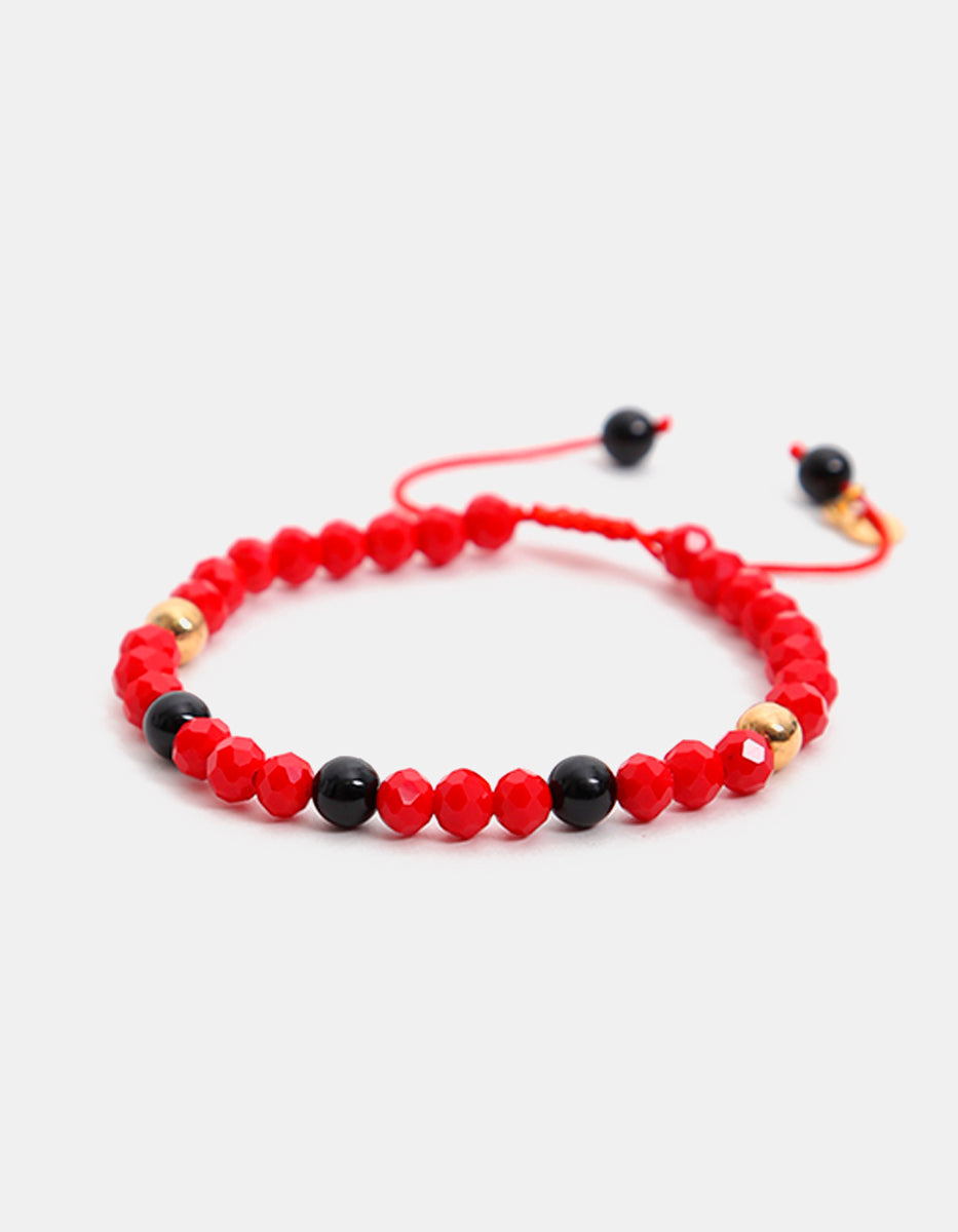 Pulsera de piedra acerina con separador de bronce en baño de oro 22 kt Nordic