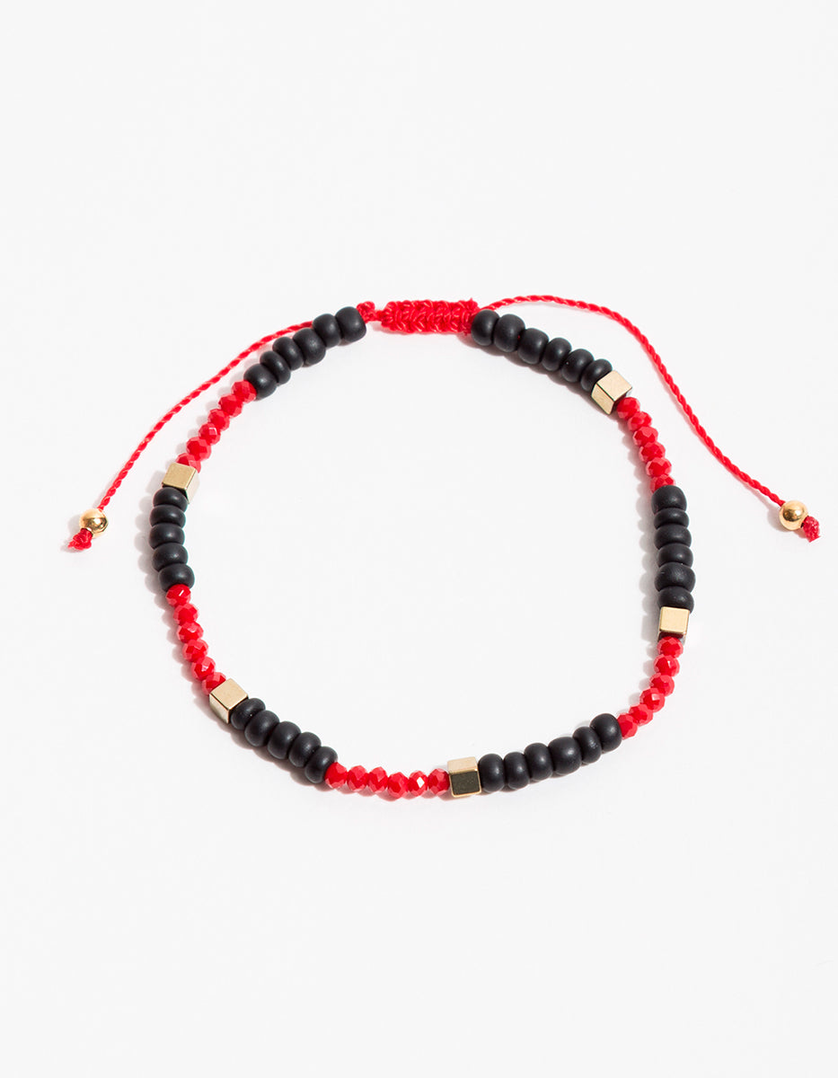 Pulsera bronce baño oro con cristal rojo y ágata negra Nordic