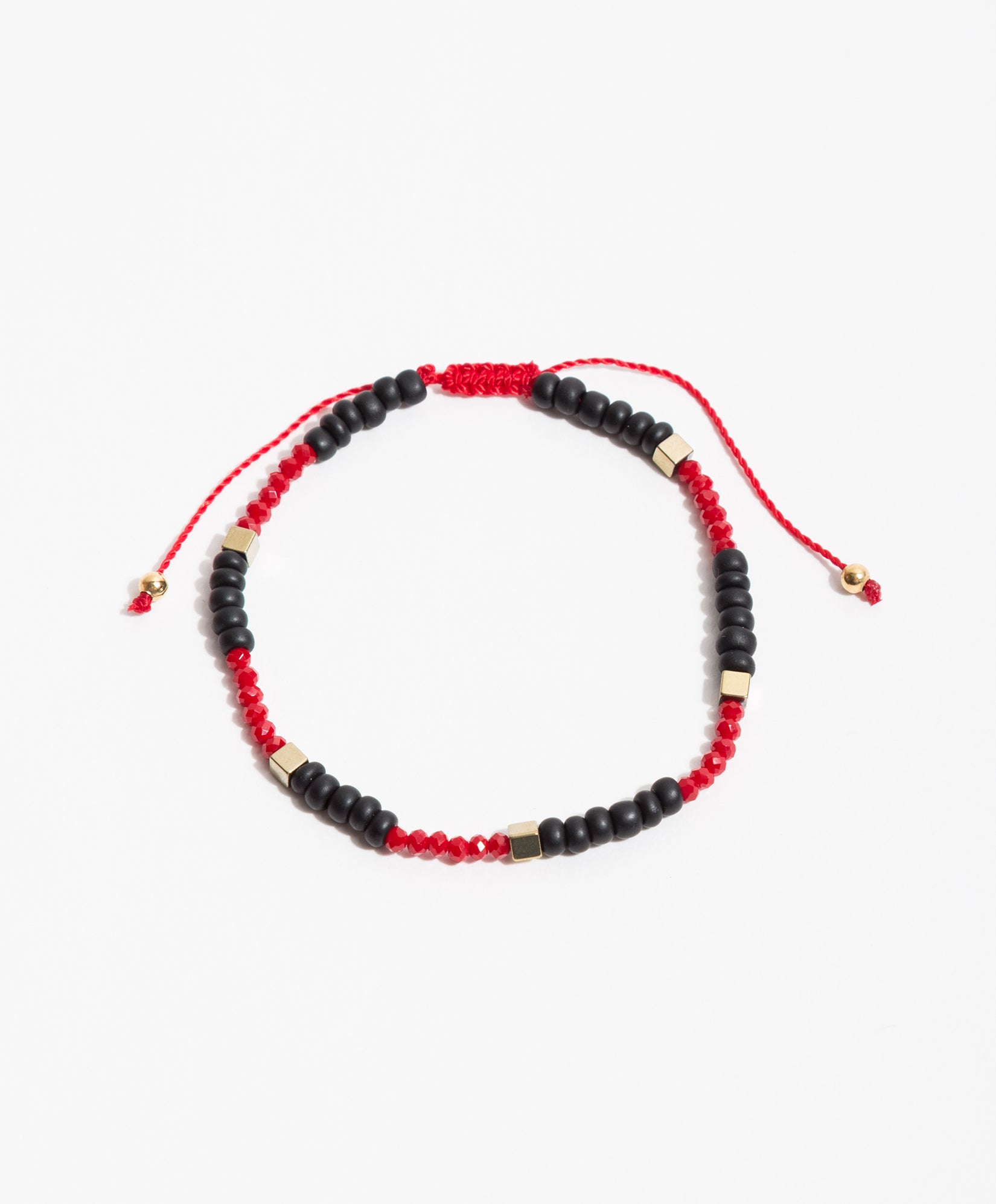 Pulsera bronce baño oro con cristal rojo y ágata negra Nordic