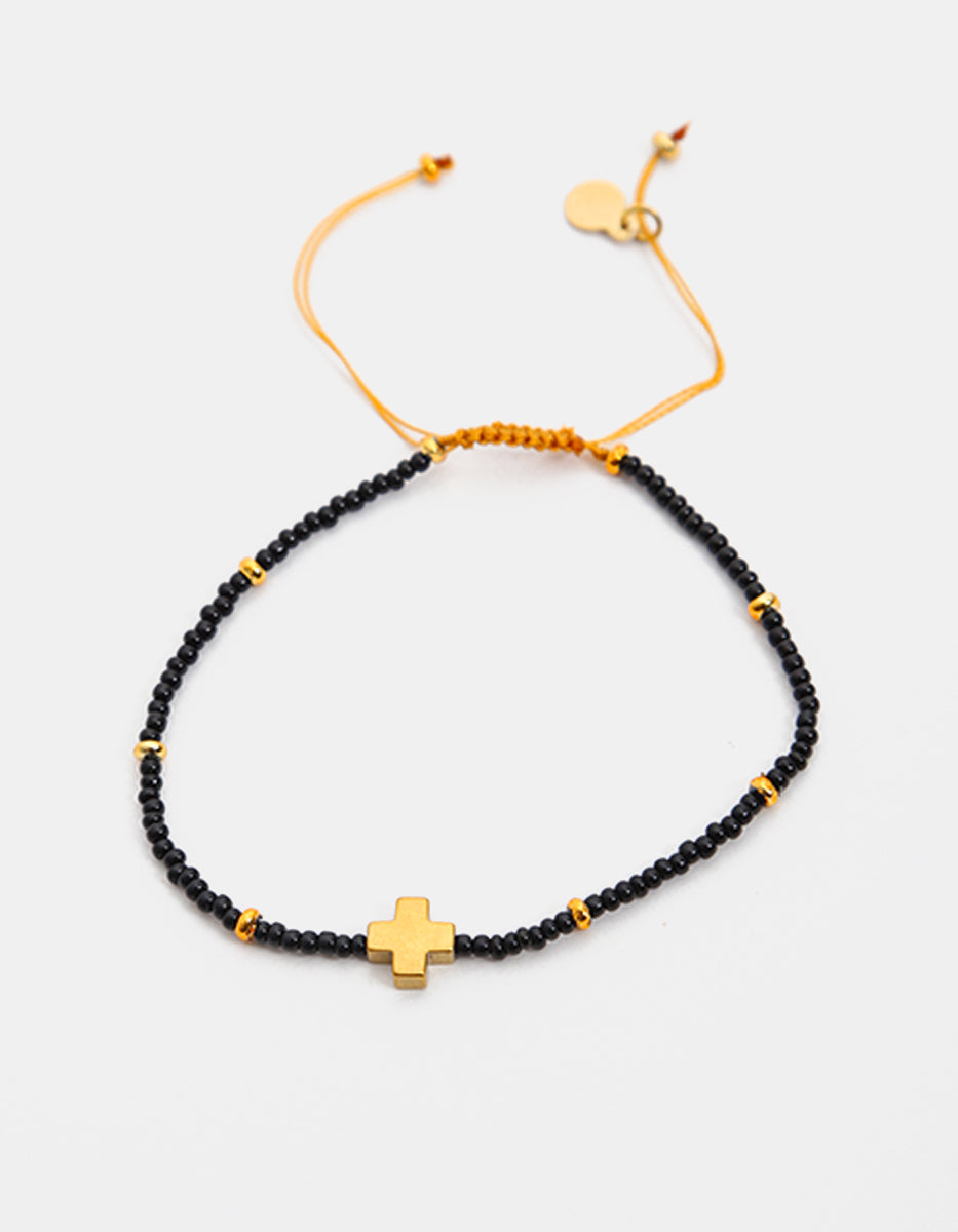 Pulsera de bronce en baño de oro 22 kt con cruz y ágata negra Nordic