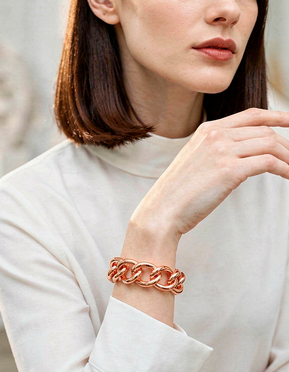 Pulsera de bronce en baño rosa con eslabones
