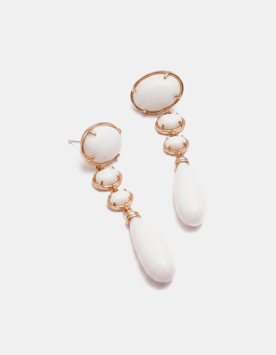 Aretes de bronce con baño de oro 22k y piedras ojo de gato blancas Marquesa