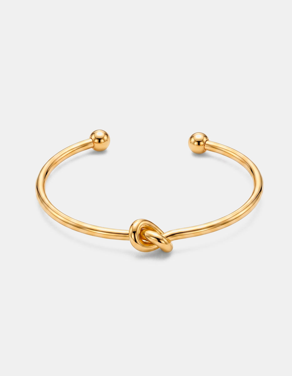 Brazalete de oro laminado 22kt con nudo central Golden Chic