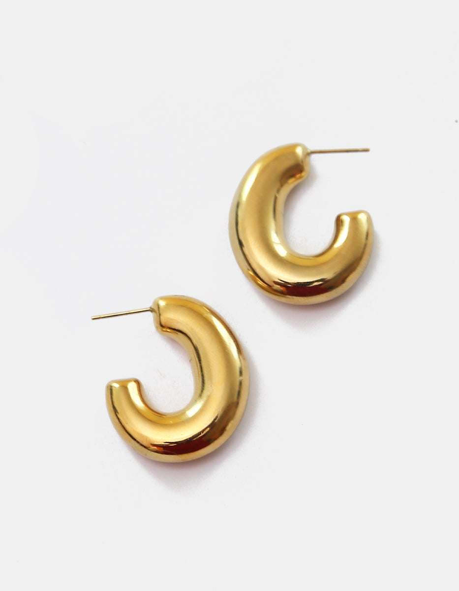 Aretes de argolla abierta gruesa ovalada en oro laminado de 22k Golden Chic