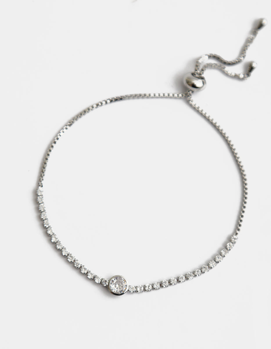Pulsera en baño de platino con topacio blanco y dije central de 5 mm Festive Style