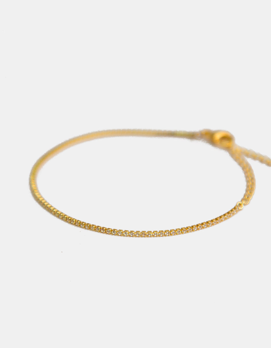 Pulsera delgada en baño de oro de 22 kt con topacios blancos en corte brillante Festive Style