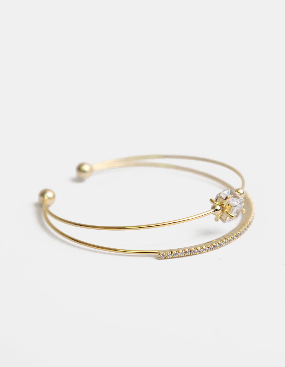 Brazalete con Baño de Oro 22 kt Doble Hilo con Topacio Blanco Cúbico Central y Topacios Blancos Festive Style