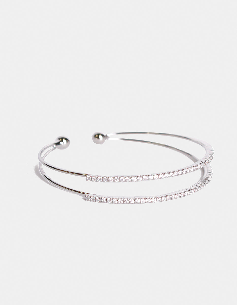 Brazalete con doble hilo y topacios blancos mini forma redonda Festive Style