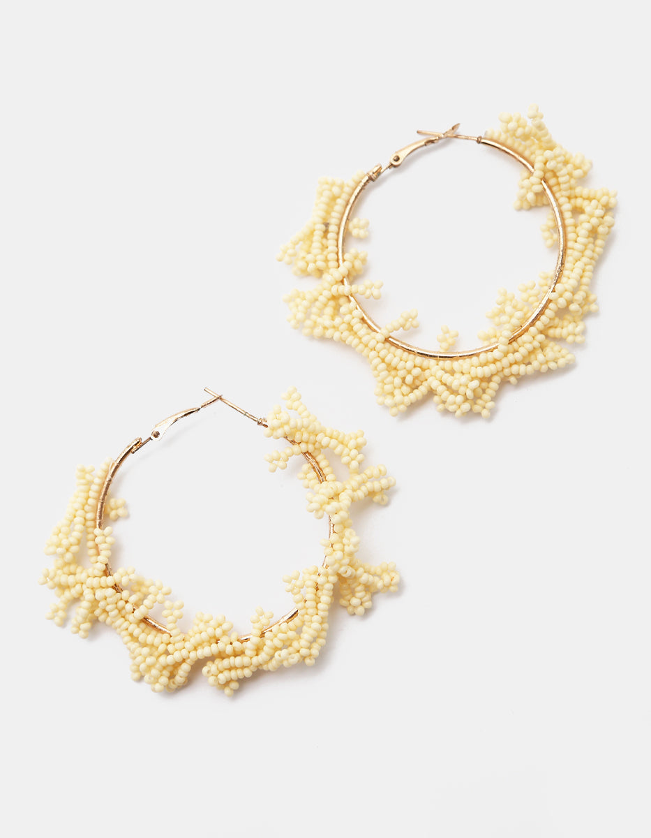 Arracadas oro laminado 18 kt con cuentas marfil Ultramar