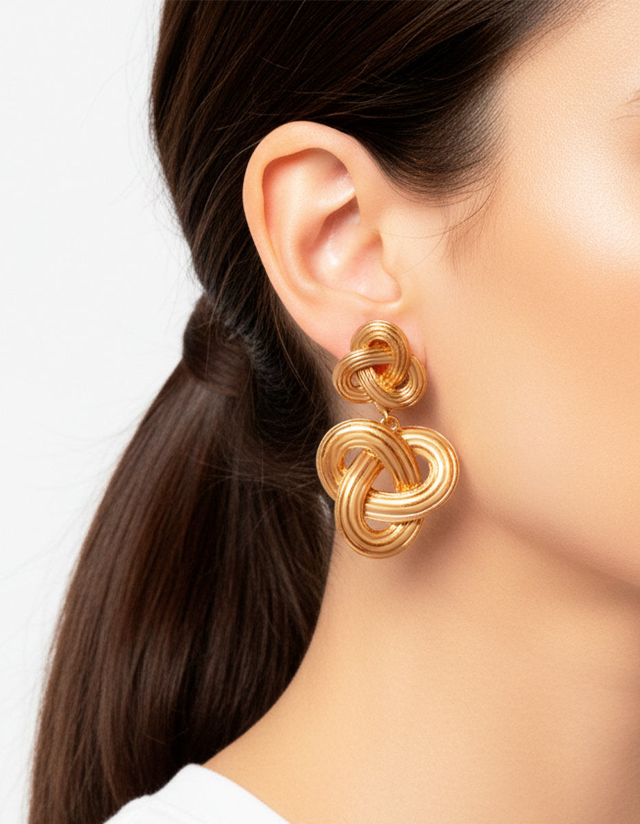 Aretes Oro laminado mate entrelazado doble Golden Chic