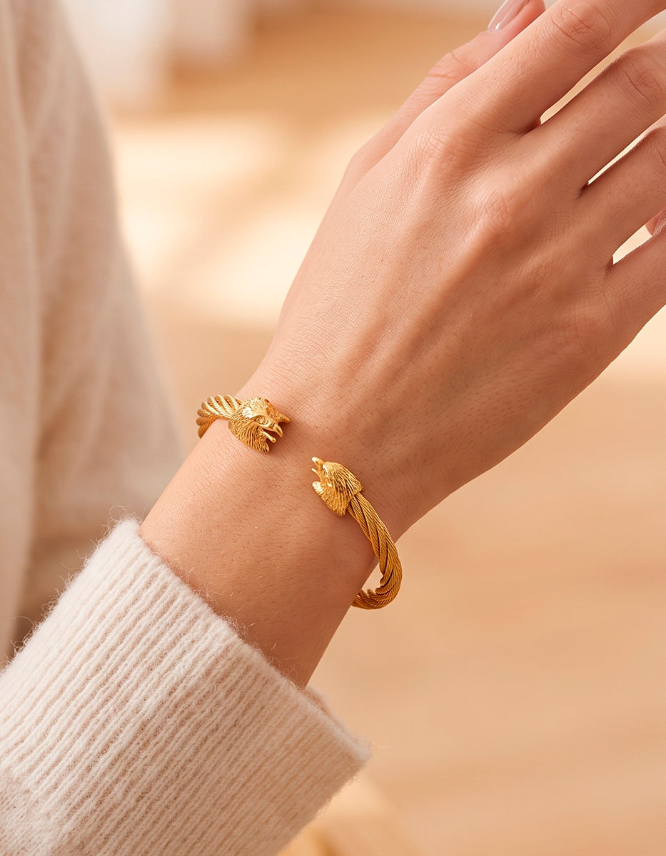 Brazalete oro laminado torzal con cabezas aguila
