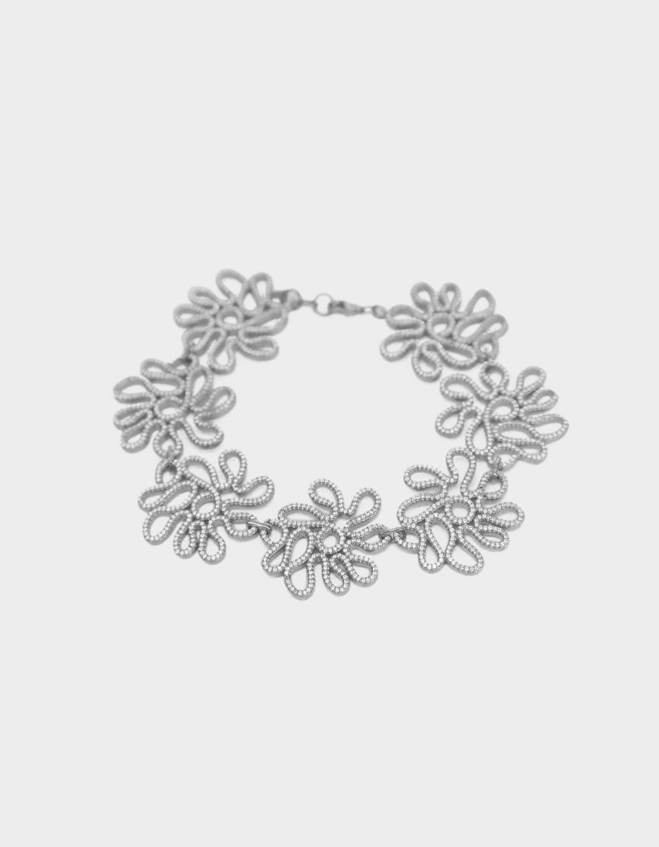 Pulsera con 1550 topacios blancos montados corte diamante Infinito Elite