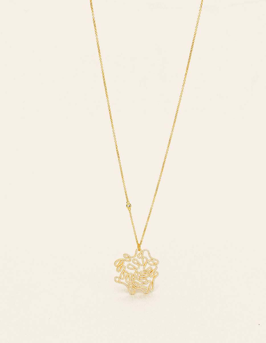 Cadena con dije redondo mediano & 400 topacios blancos montados corte diamante