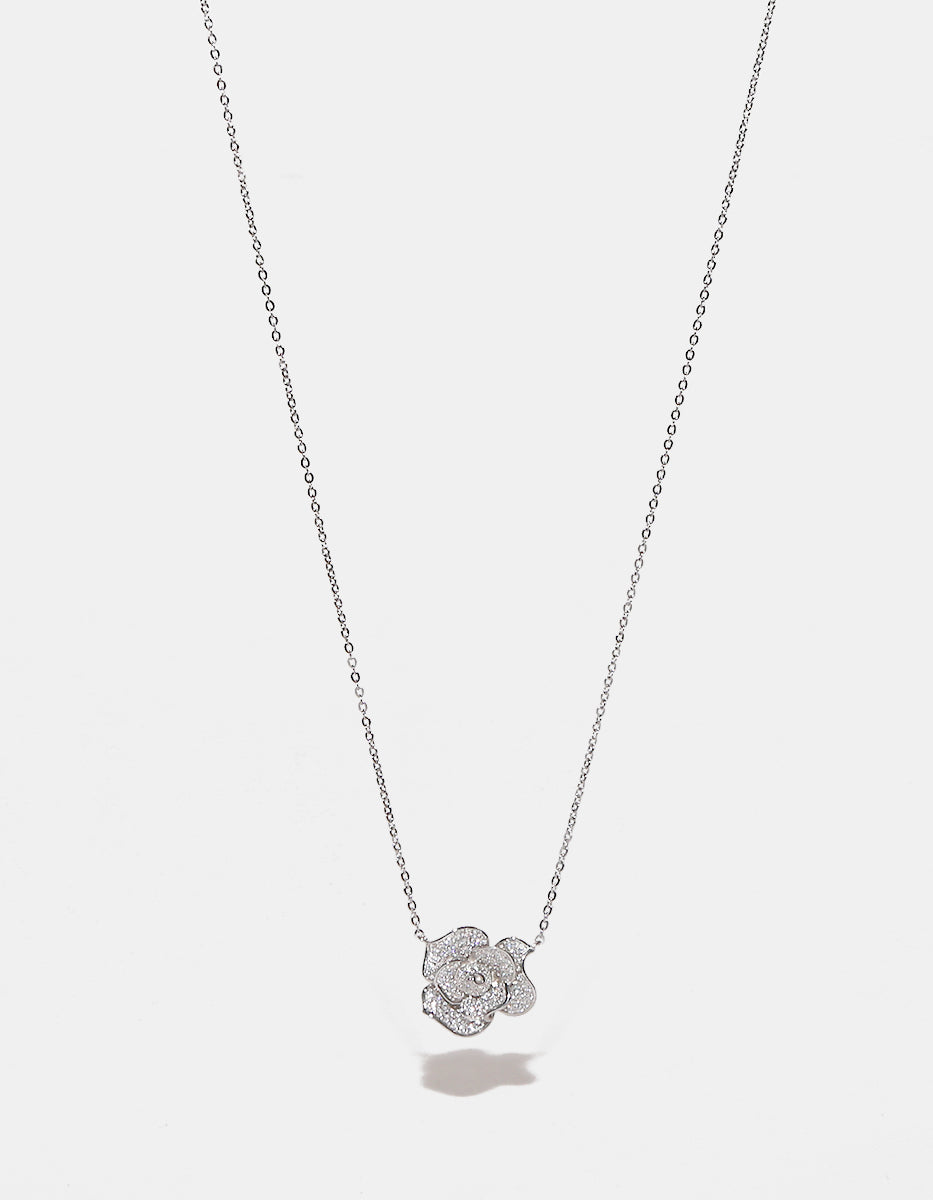 Colgante en Plata 925 bañados en Rodio Blanco con Topacios Blancos Sublime