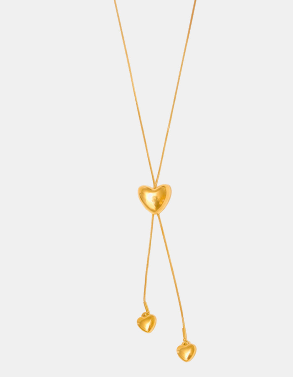 Collar en bronce con baño de oro 22 kt y dije de corazón con doble caída de corazones mini Love Story