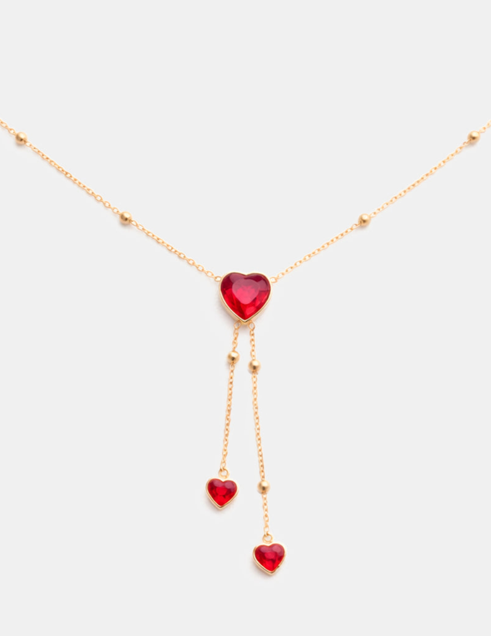 Collar con extensión ajustable hasta 55 cm con 3 corazones de Espinolita Roja tono rubí Love Story