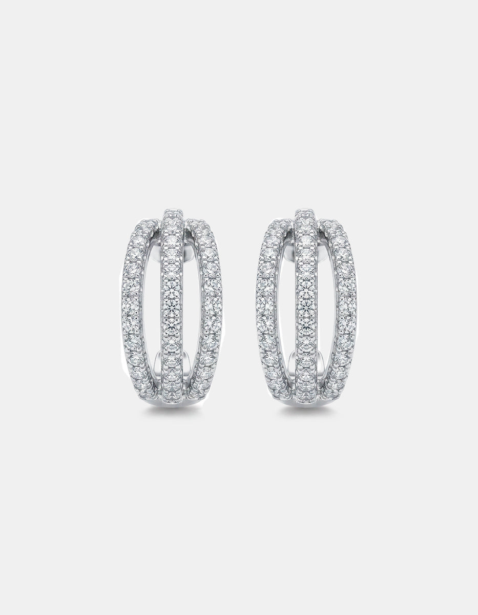 Aretes de metal noble con baño de platino en forma de aro triple con topacios blancos corte brillante Festive Style