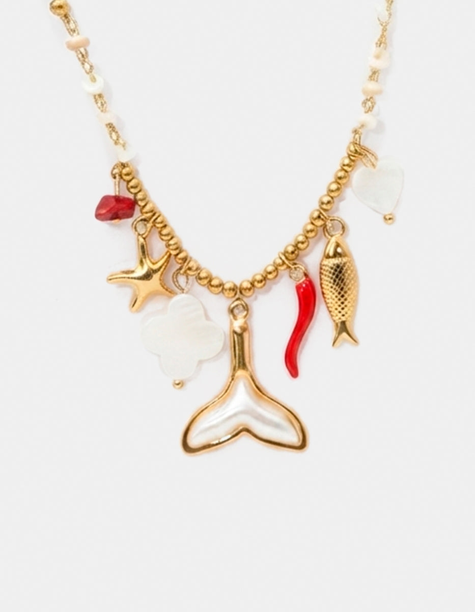 Collar de Gold-filled con dijes de cola de ballena en madreperla, pez, estrella y coral Ultramar