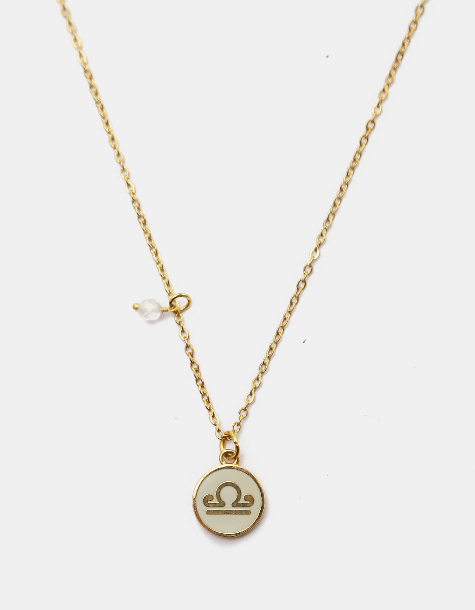 Collar Gold-Filled de 22kt con charm esmaltado de Libra y cristal austriaco transparente Zodiac