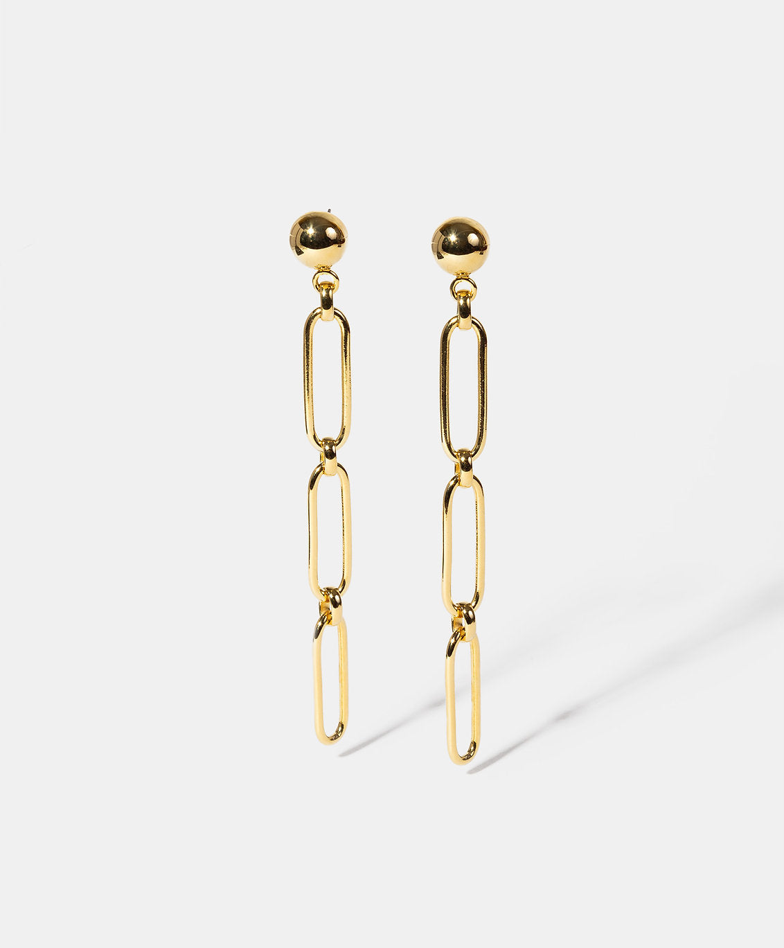 Aretes bronce baño oro 22kt Universe