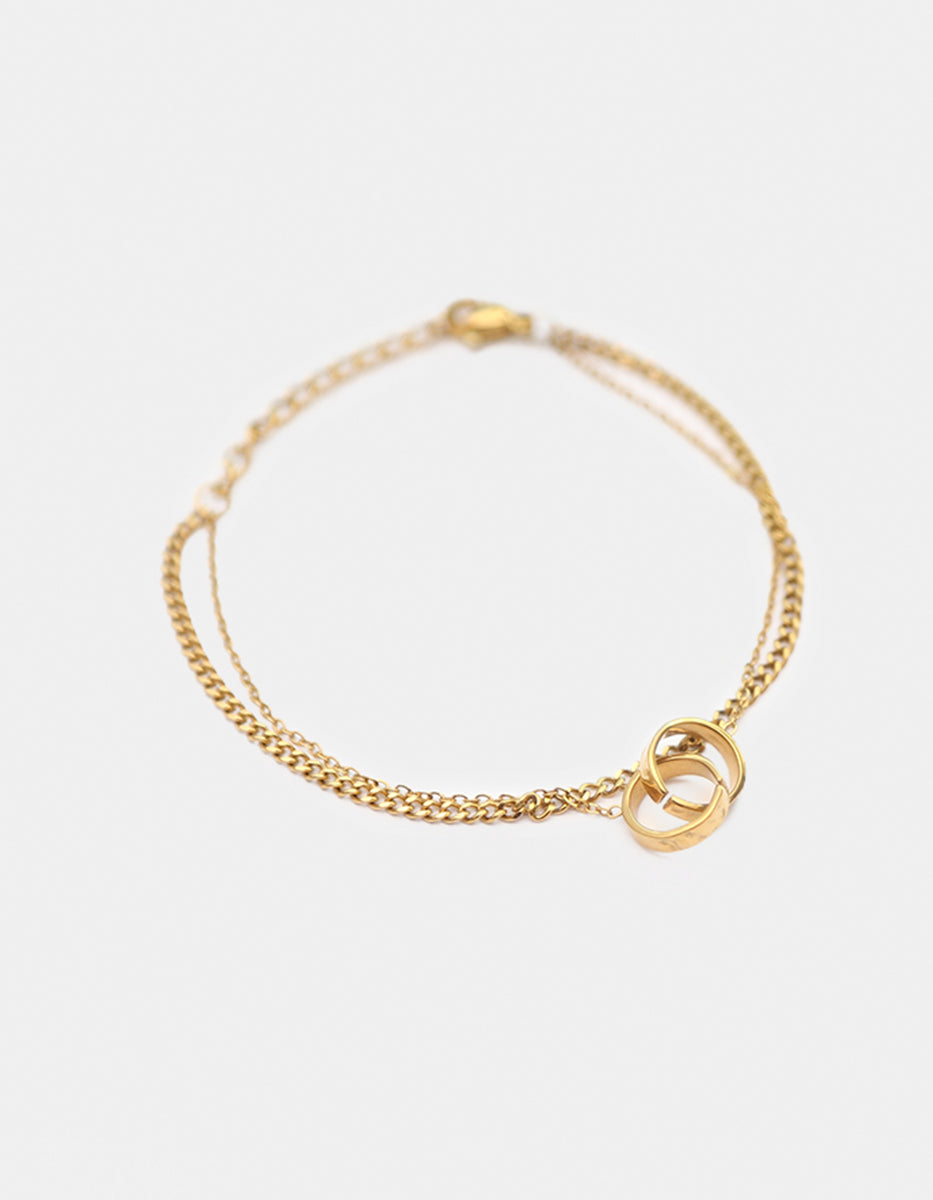 Pulsera de oro laminado 22kt con doble cadena y aros entrelazados Golden Chic