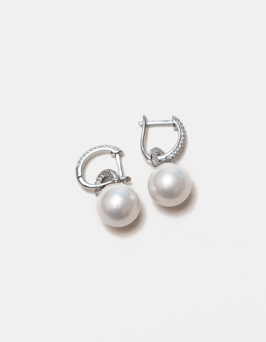 Aretes de Plata .925 con baño de rodio, topacios blancos y perla mabe Festive Style