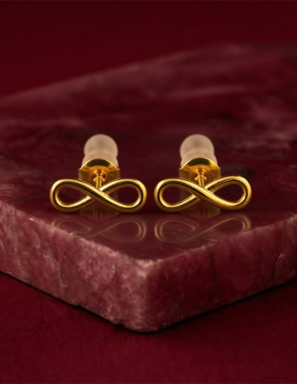 Broqueles de bronce en baño de oro de 22kt con símbolo de infinito Love Story
