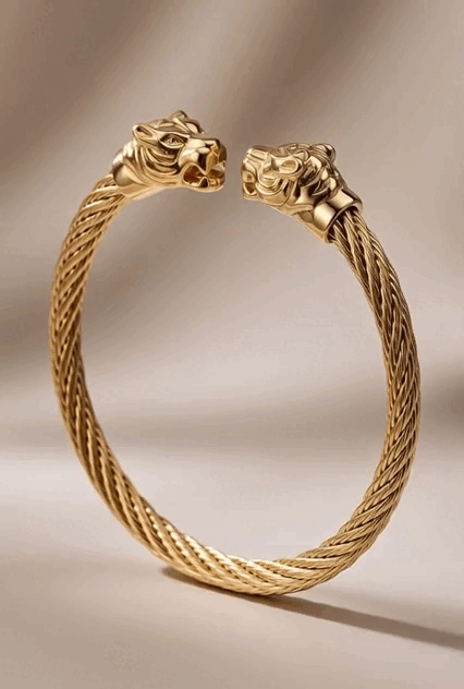 Brazalete oro laminado cable torzal con dos cabezas de tigre Golden Chic
