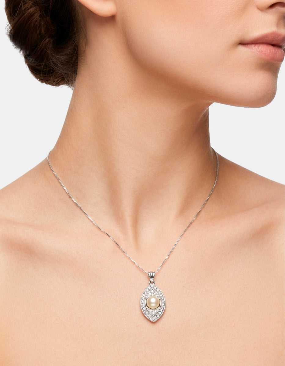 Dije con cadena de plata .925 en forma de ojo con perla mabe y topacios blancos Marquesa