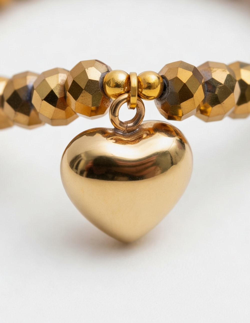Set de Aretes y pulsera Cupido con corazón