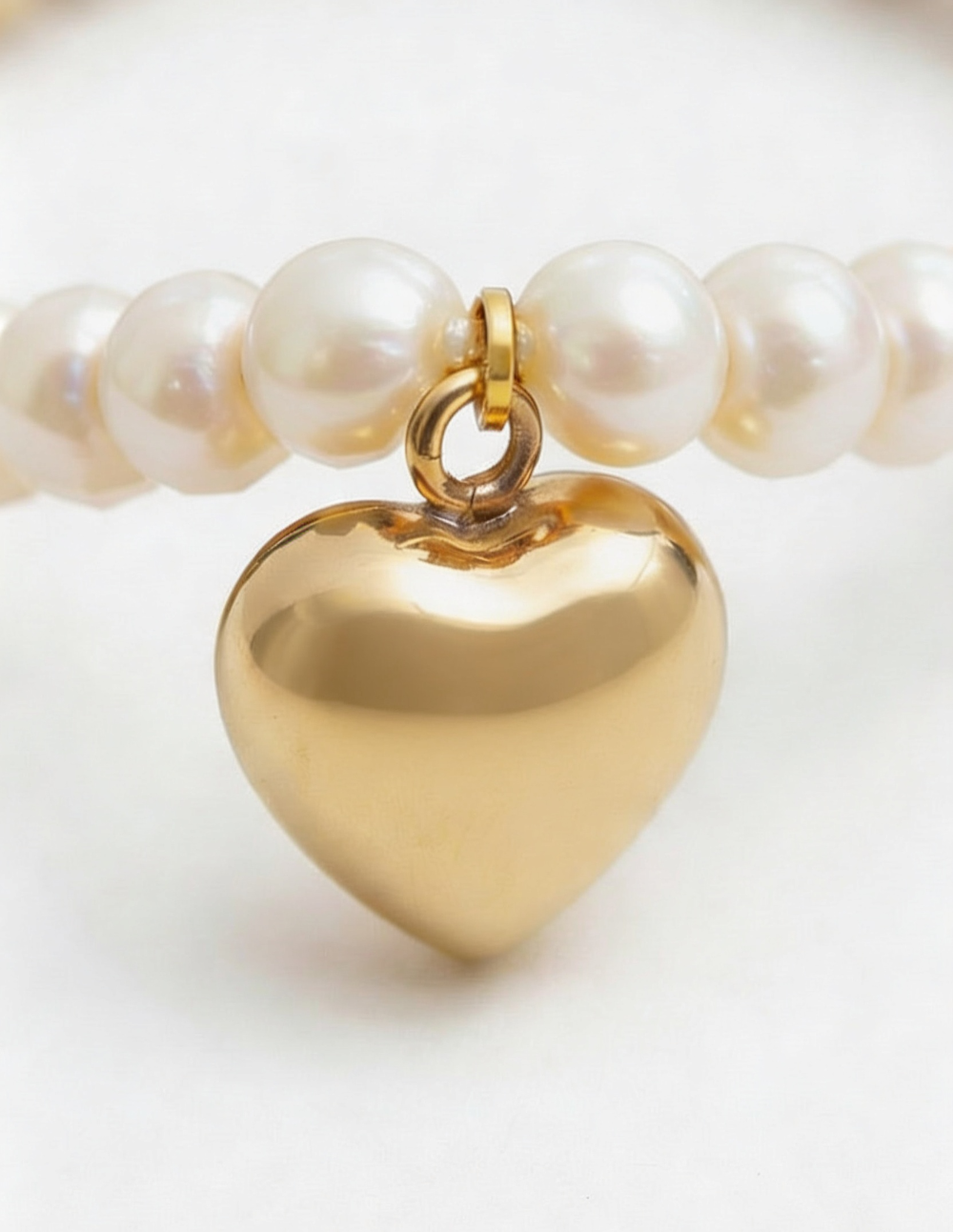 Set de Pulsera de perlas mabe con corazón y broqueles con corazón