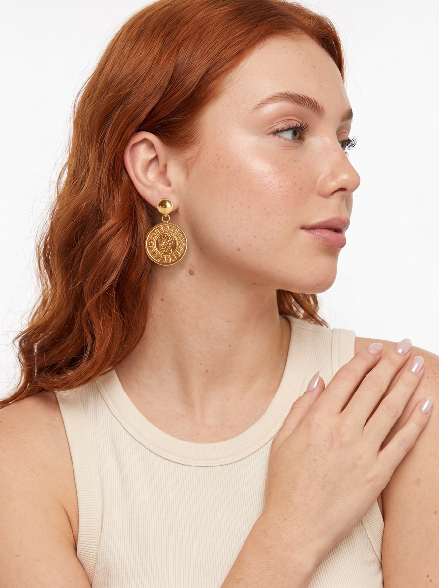 Aretes de bronce con baño de oro 22k y dije con grabado maya Códice