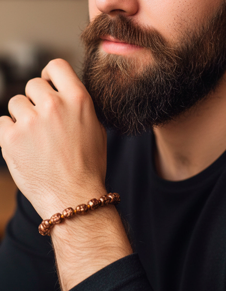 Pulsera de bronce acabado brillante con cabezas de Buda Nordic