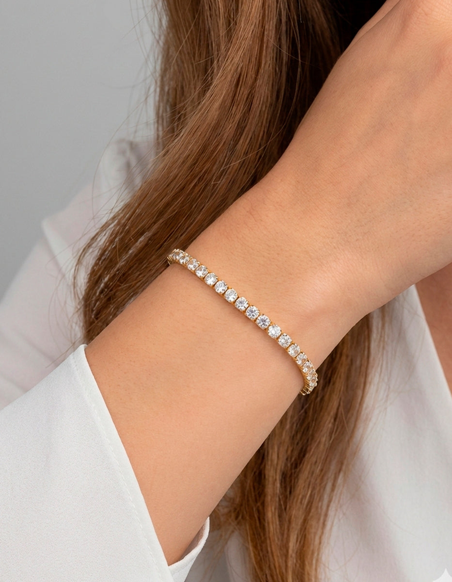 Pulsera en plata .925 con baño de oro 22 kt y topacios blancos en forma circular Festive Style