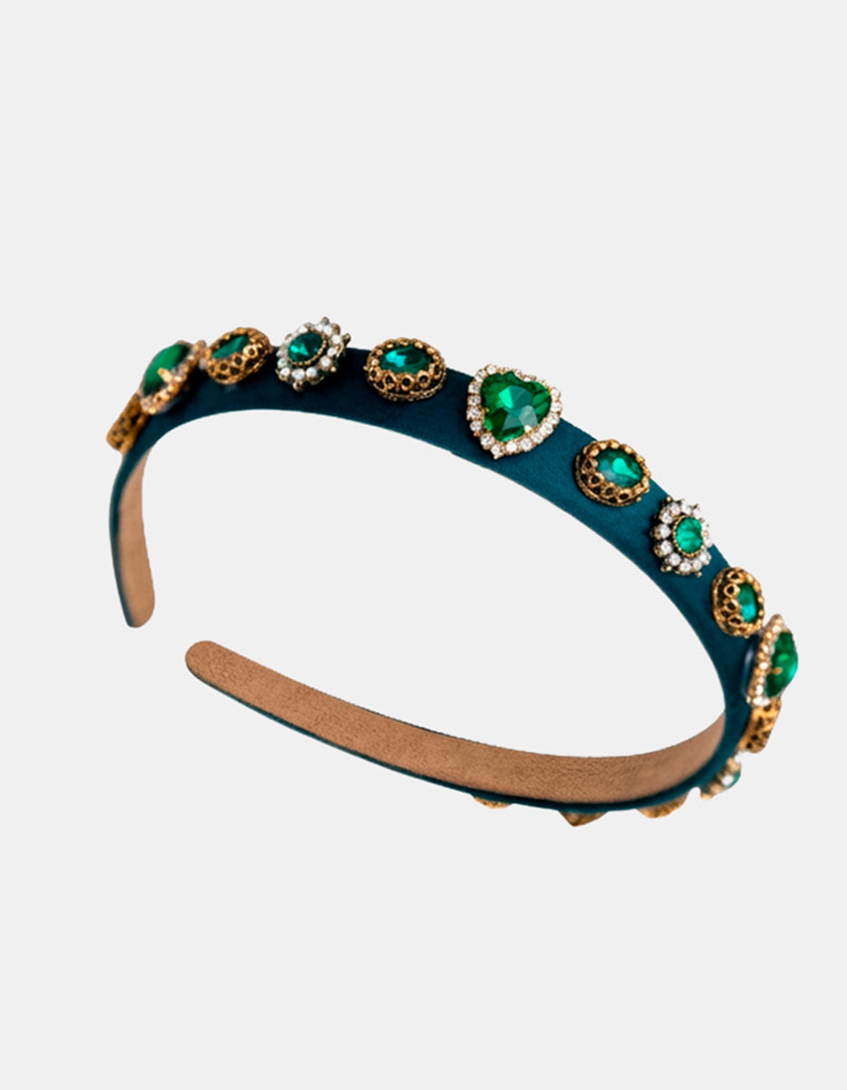 Diadema de terciopelo con cristales facetados verde esmeralda y ornamentos dorados