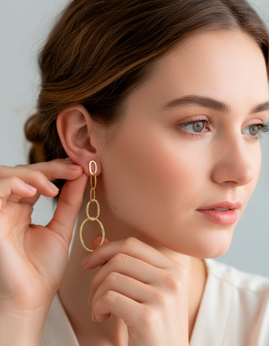 Aretes gold-filled con aros ovales entrelazados Golden Chic