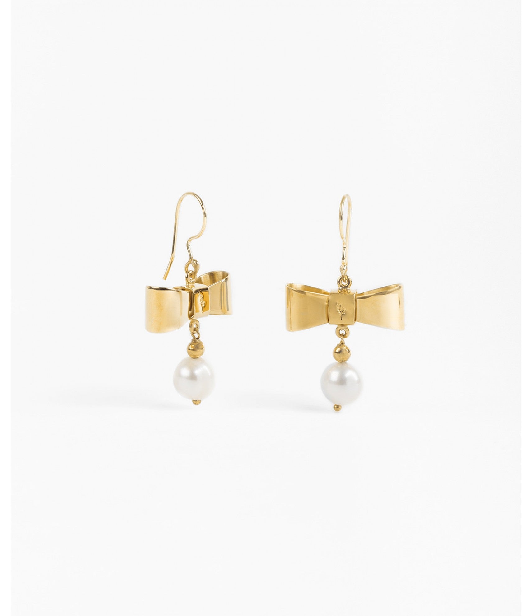 Aretes con forma moño & perla mabe Viena