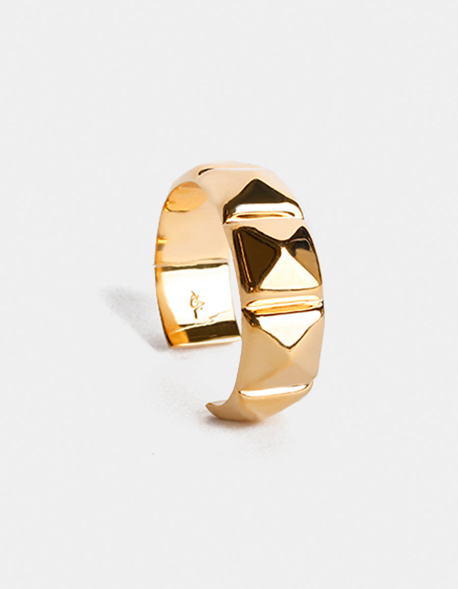 Brazalete de metal noble dorado con estoperoles