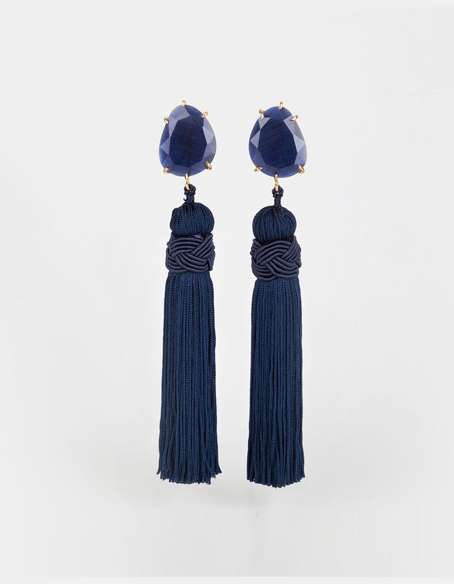 Aretes de plata .925 en baño vermeil 22k con ojo de gato azul y pompón a juego